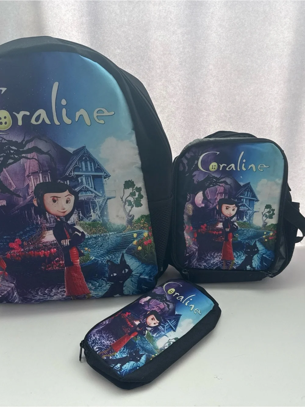 Coraline Backpack, Lunch Bag & Pencil Case Set in Blue purple red
